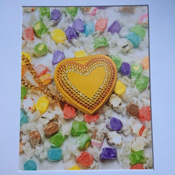 Tara Tarantino heart coin purse surrounded by candy
Art matted - Picture 2 of 3
